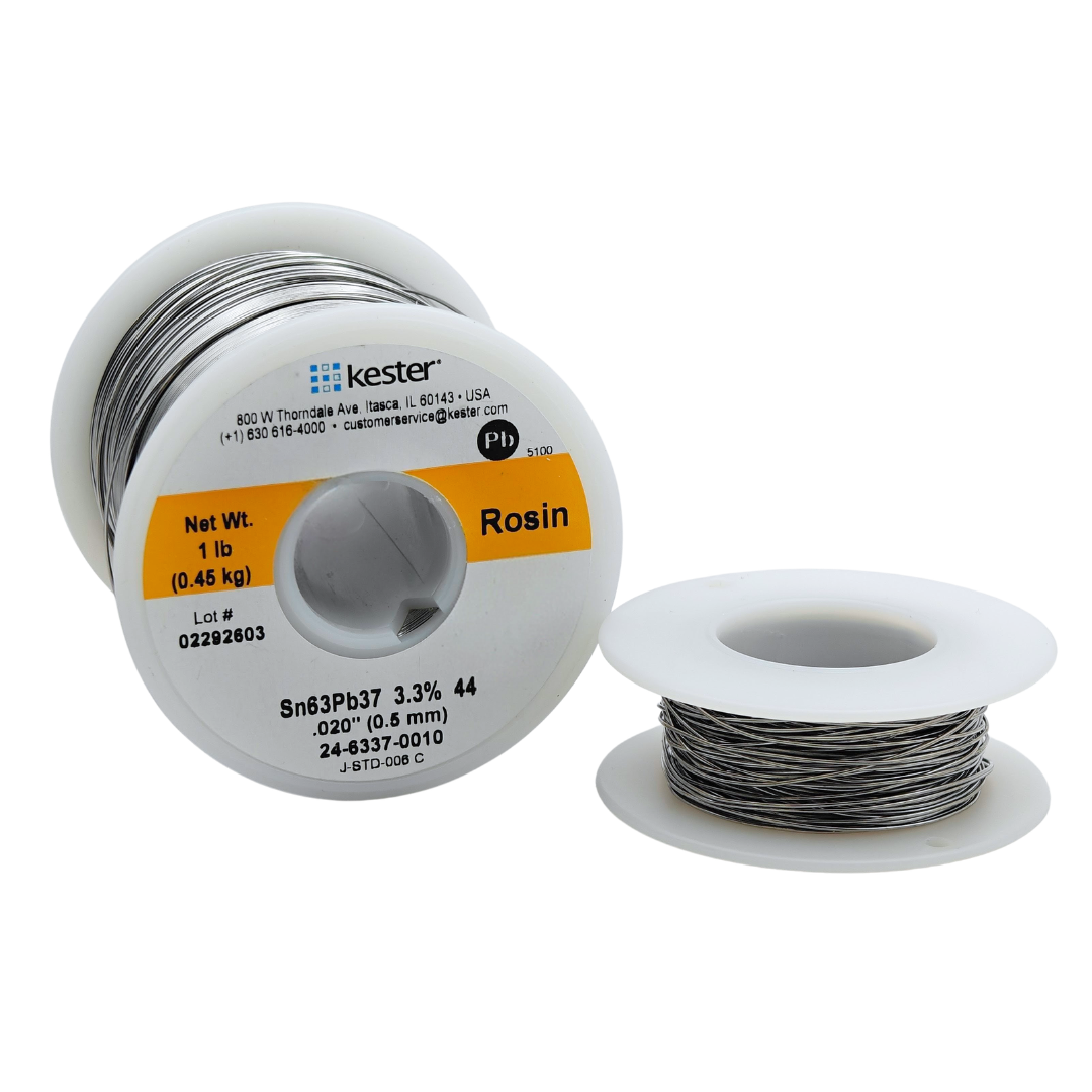 Two spools of silver solder wire on a white background