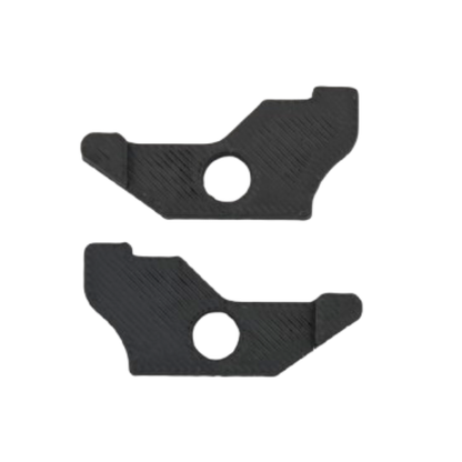 Two black plastic pieces with circular cutouts on a white background