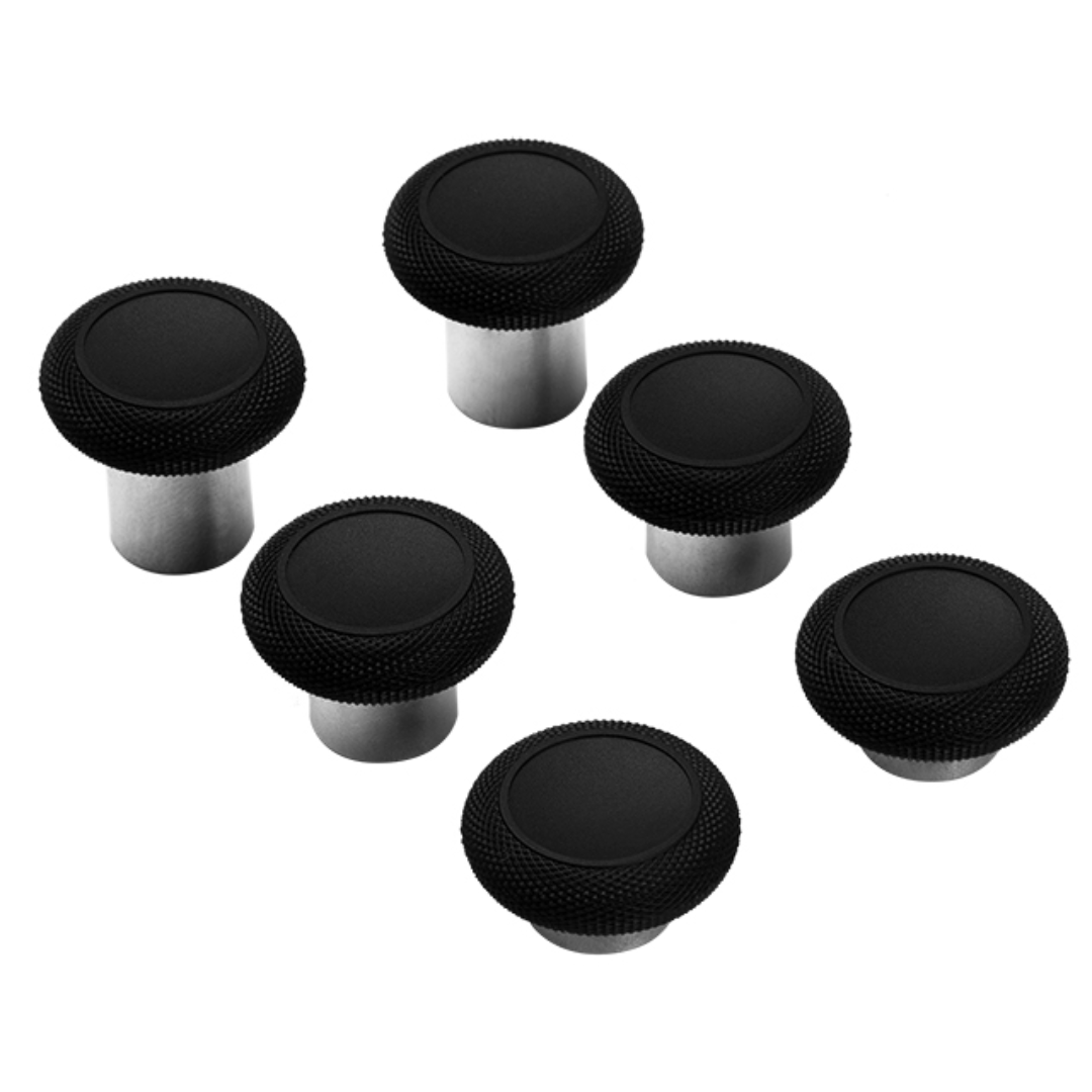 Set of six black controller thumbsticks with textured edges and silver metal stems in varying heights on a white background