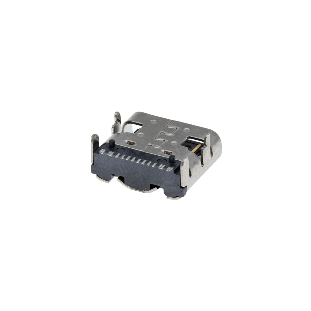 Close-up of a small PS5 metal charging port component with black inner contacts on a white background