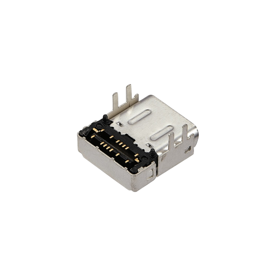 Close-up of a small Xbox charging port component with black inner contacts on a white background